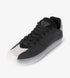 Black low top sneakers