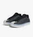 Black low top sneakers