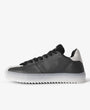 Black low top sneakers