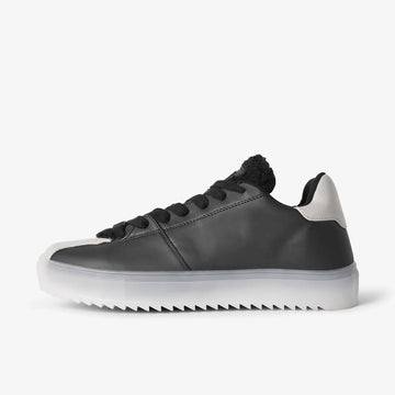 Black low top sneakers