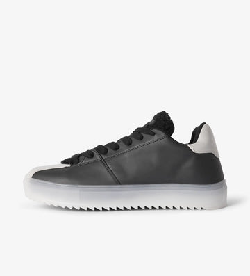 Black low top sneakers