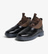 black and brown brogue boots