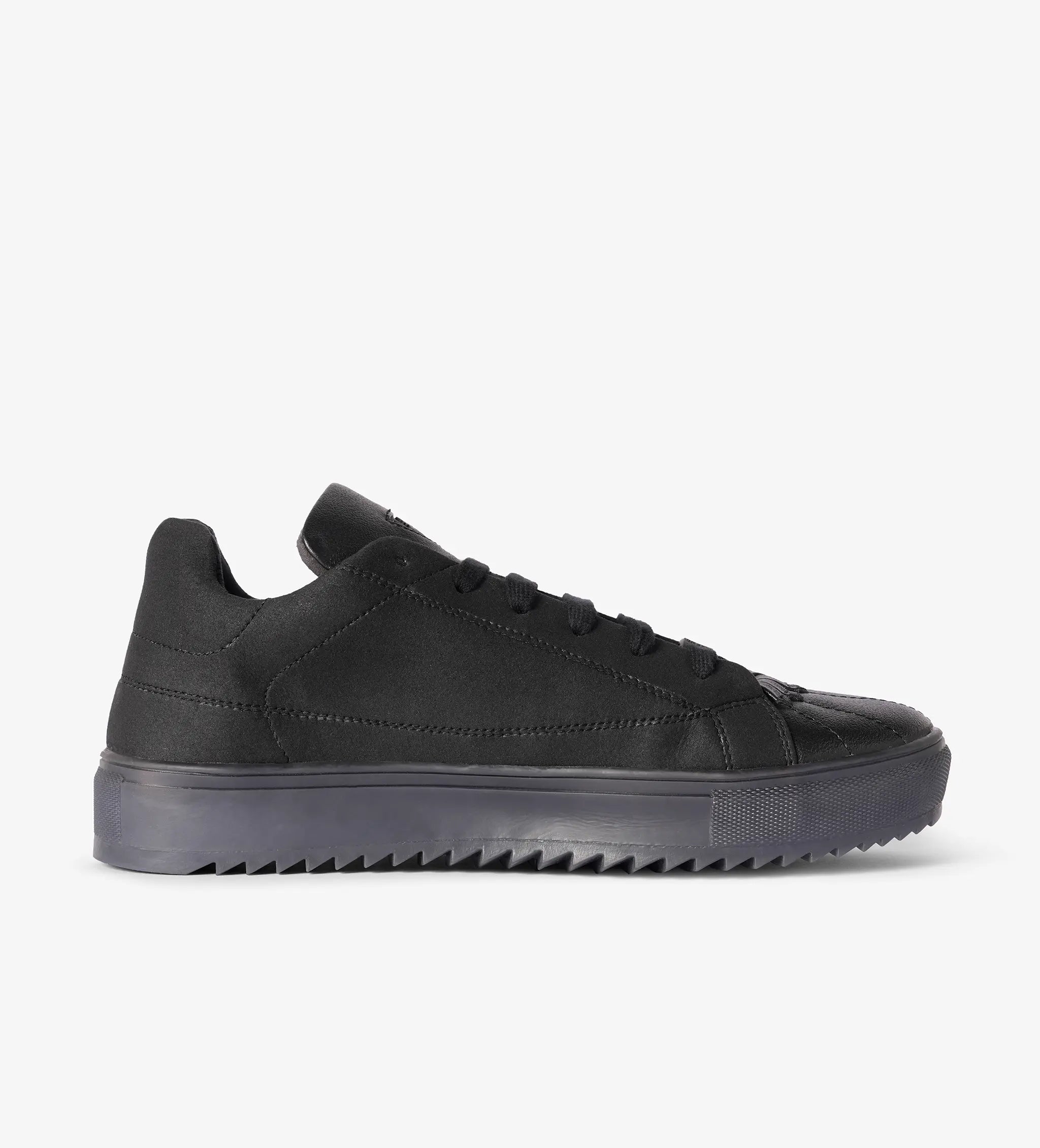 black low top sneakers