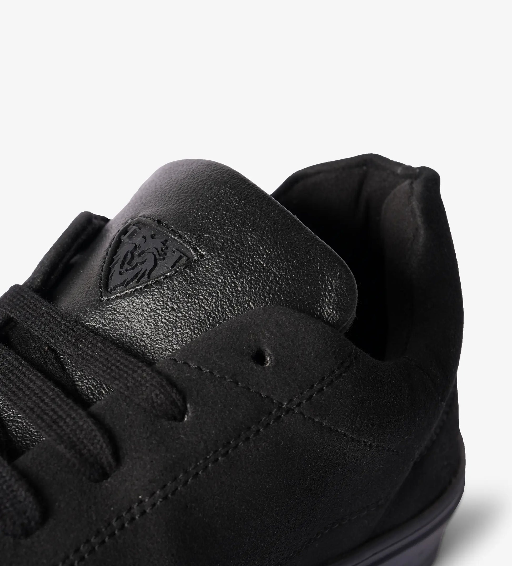 black low top sneakers