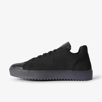 black low top sneakers