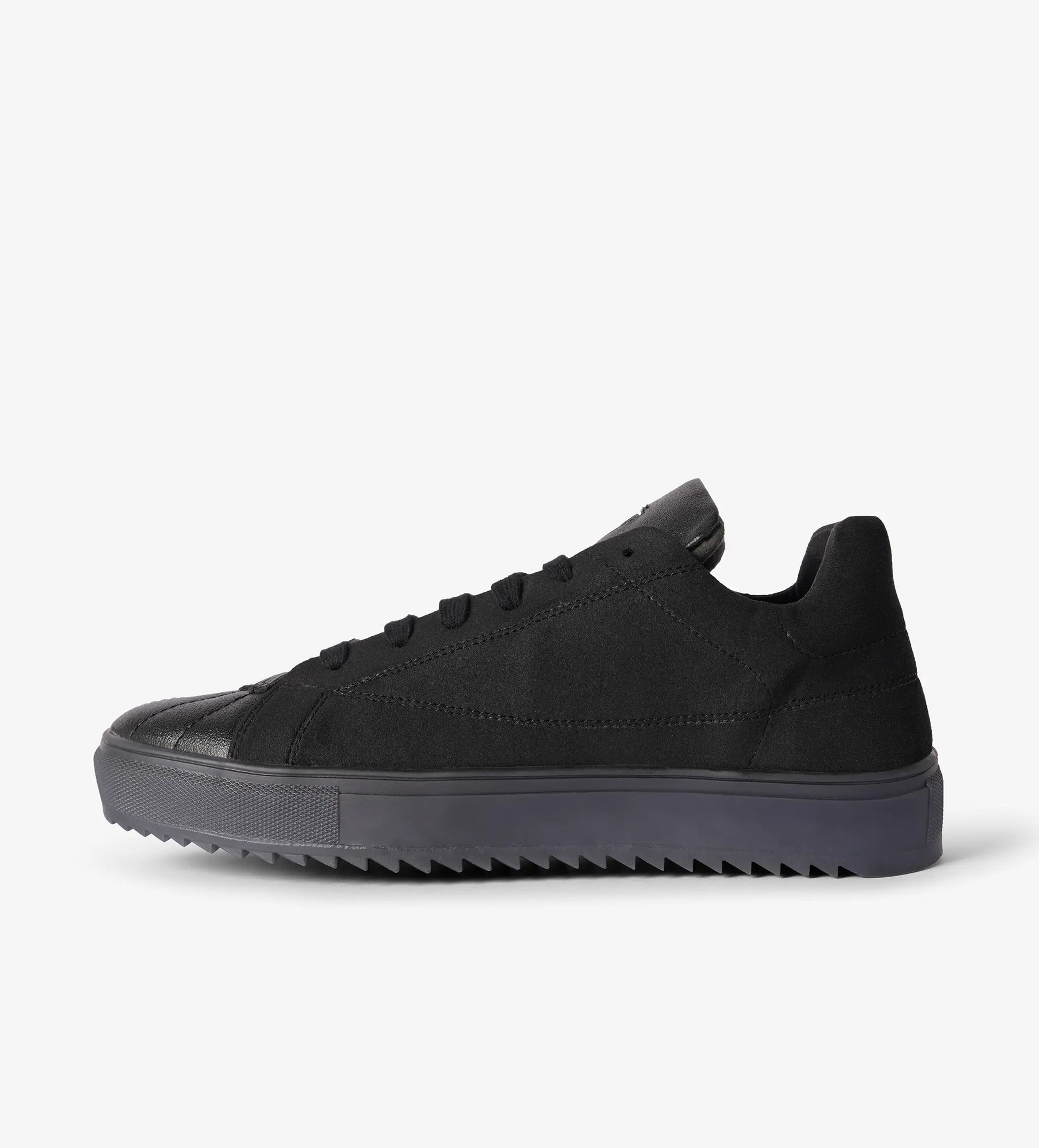 black low top sneakers